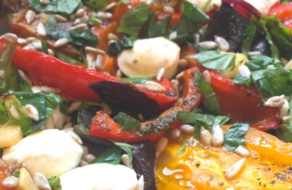 Salade jeunes pousses et légumes au four